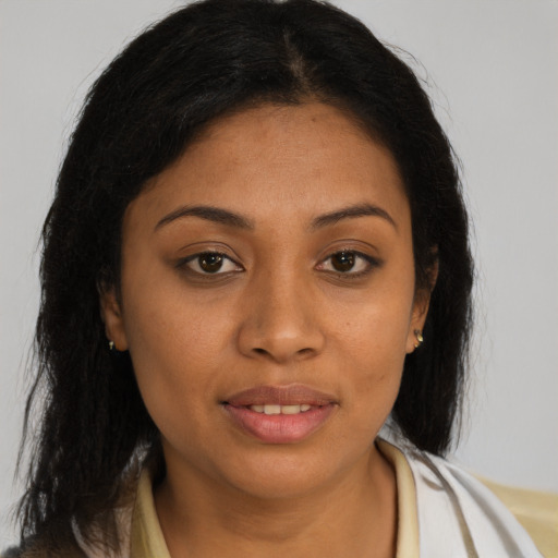 Joyful black young-adult female with medium  brown hair and brown eyes