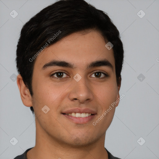 Joyful latino young-adult male with short  brown hair and brown eyes