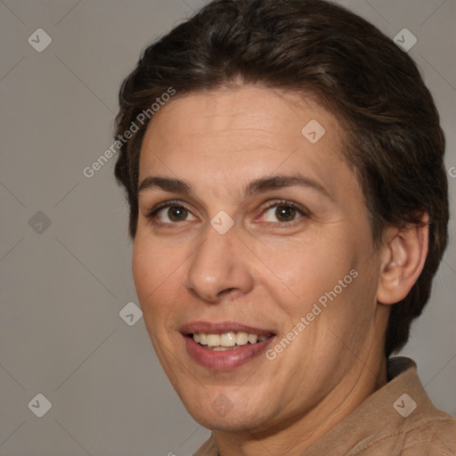 Joyful white adult female with short  brown hair and brown eyes