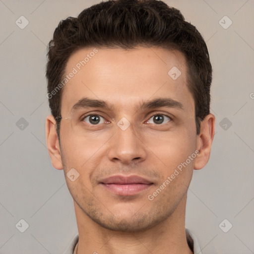 Joyful white young-adult male with short  brown hair and brown eyes