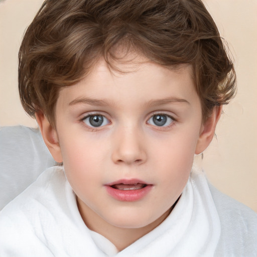 Joyful white child male with short  brown hair and brown eyes