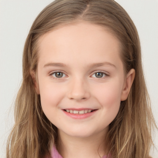 Joyful white child female with long  brown hair and brown eyes