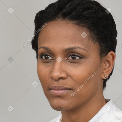 Neutral black young-adult female with short  black hair and brown eyes