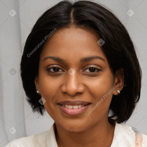 Joyful black young-adult female with medium  brown hair and brown eyes