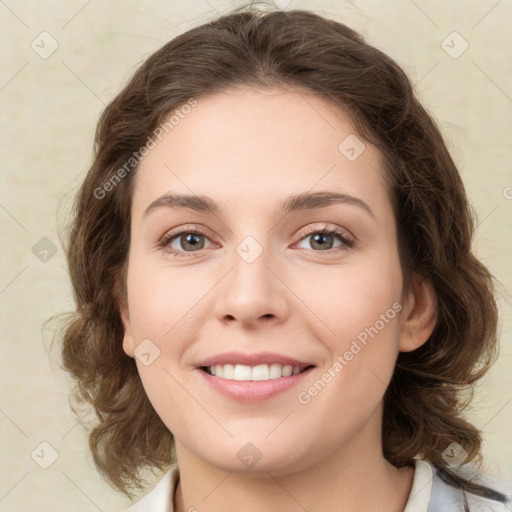 Joyful white young-adult female with medium  brown hair and green eyes