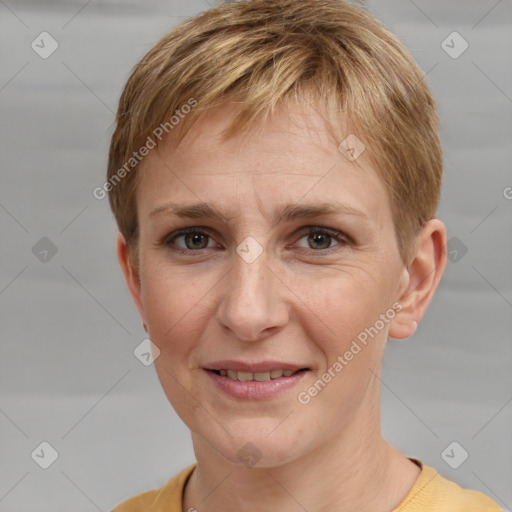 Joyful white adult female with short  brown hair and grey eyes