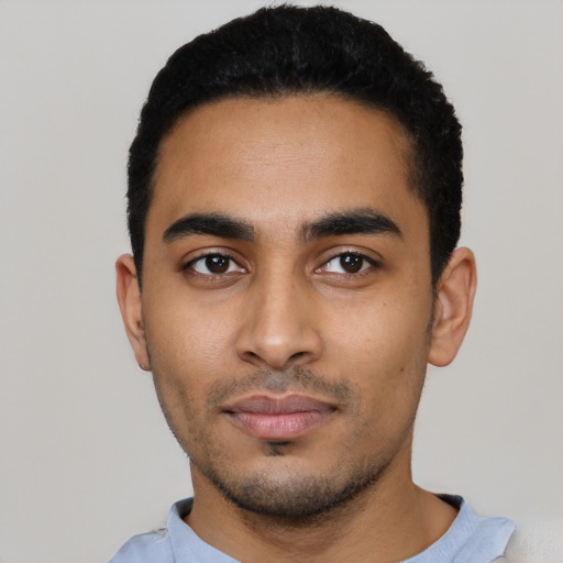 Neutral latino young-adult male with short  black hair and brown eyes