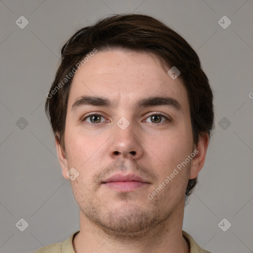 Neutral white young-adult male with short  brown hair and grey eyes