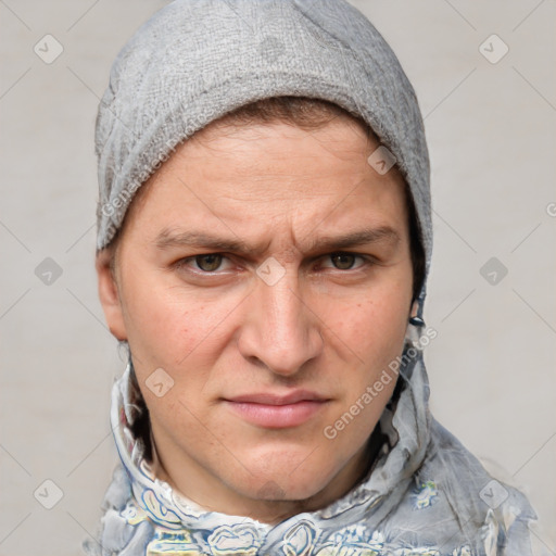 Joyful white adult male with short  brown hair and grey eyes