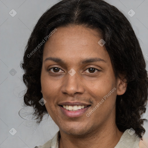 Joyful black young-adult female with medium  brown hair and brown eyes