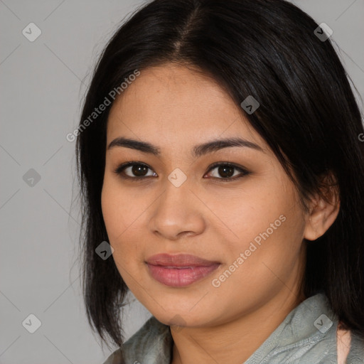 Joyful asian young-adult female with medium  black hair and brown eyes