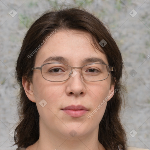 Joyful white adult female with medium  brown hair and grey eyes