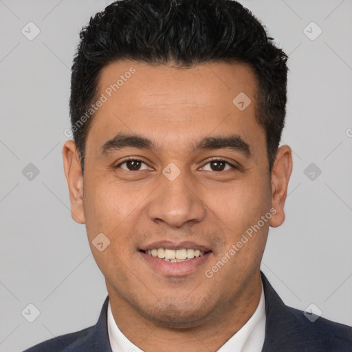 Joyful white young-adult male with short  black hair and brown eyes