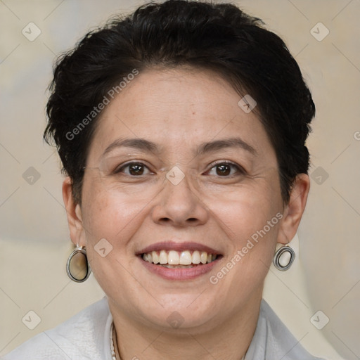 Joyful white adult female with short  brown hair and brown eyes