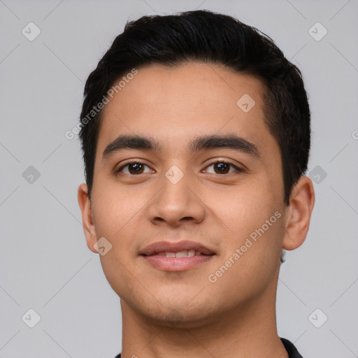 Joyful latino young-adult male with short  black hair and brown eyes
