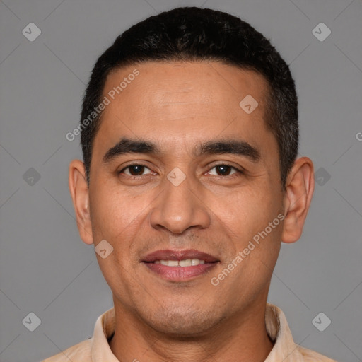 Joyful latino young-adult male with short  black hair and brown eyes