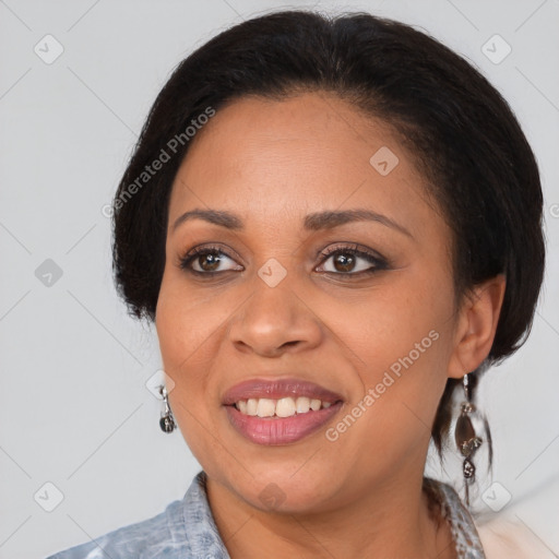 Joyful black young-adult female with medium  brown hair and brown eyes