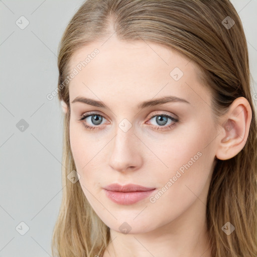 Neutral white young-adult female with long  brown hair and blue eyes