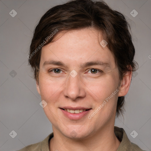 Joyful white adult female with medium  brown hair and grey eyes