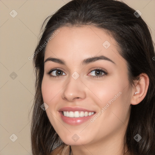 Joyful white young-adult female with medium  brown hair and brown eyes