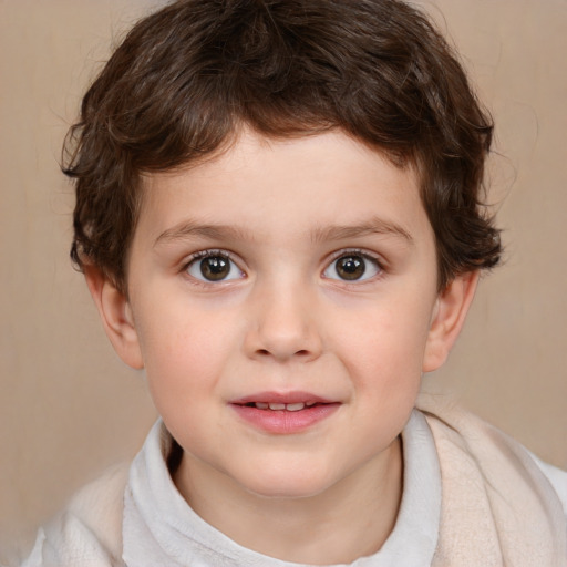 Joyful white child male with short  brown hair and brown eyes