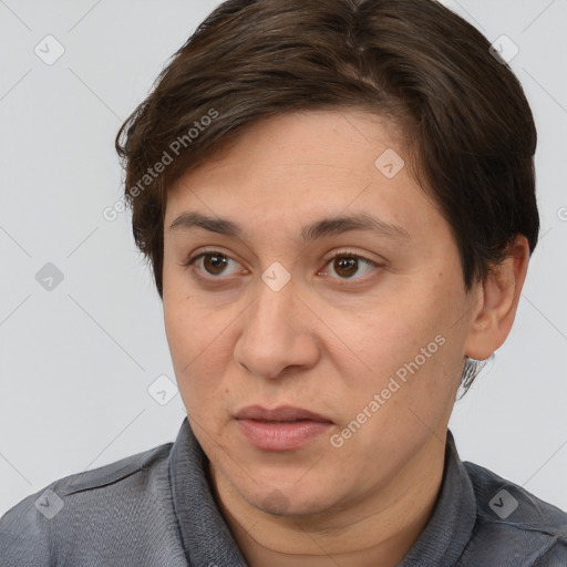 Joyful white adult female with short  brown hair and brown eyes