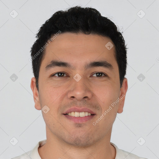 Joyful asian young-adult male with short  black hair and brown eyes