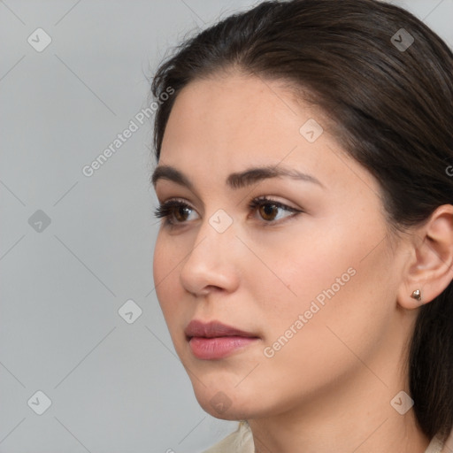 Neutral white young-adult female with medium  brown hair and brown eyes