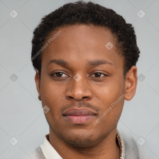Neutral latino young-adult male with short  brown hair and brown eyes