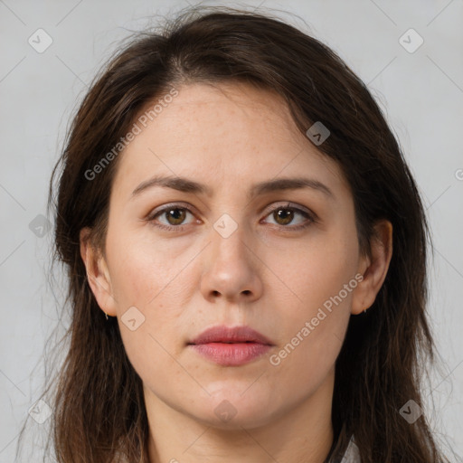 Neutral white young-adult female with long  brown hair and brown eyes