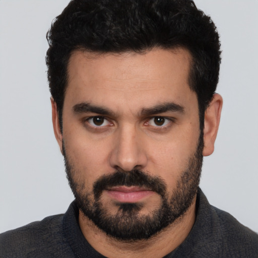 Neutral white young-adult male with short  black hair and brown eyes
