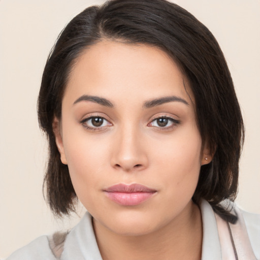 Neutral white young-adult female with medium  brown hair and brown eyes