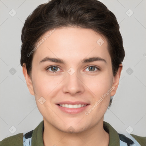 Joyful white young-adult female with short  brown hair and brown eyes