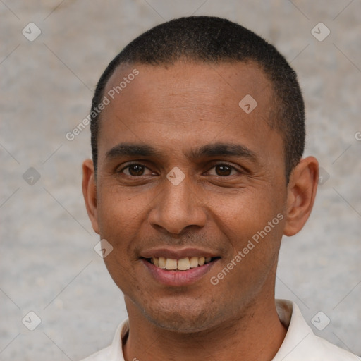 Joyful black young-adult male with short  black hair and brown eyes