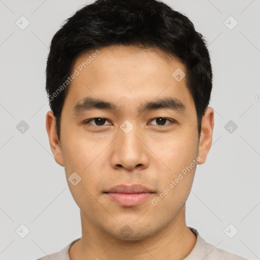 Neutral asian young-adult male with short  black hair and brown eyes