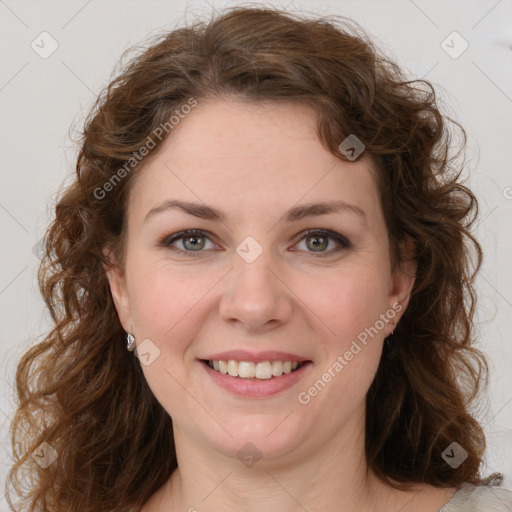 Joyful white young-adult female with medium  brown hair and green eyes