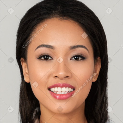 Joyful latino young-adult female with long  black hair and brown eyes