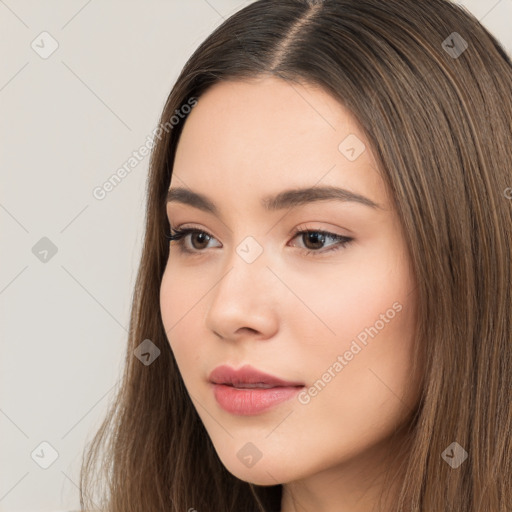 Neutral white young-adult female with long  brown hair and brown eyes