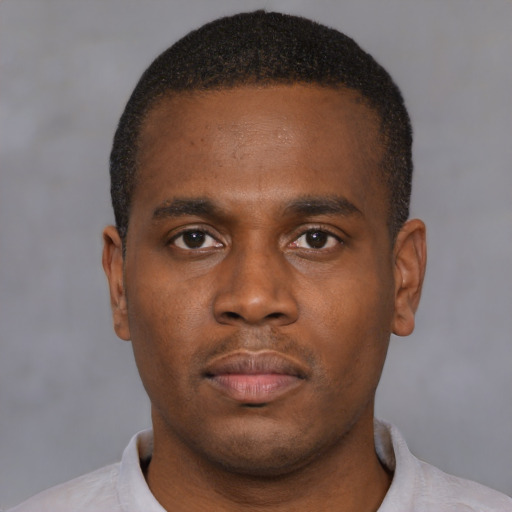 Neutral black young-adult male with short  brown hair and brown eyes