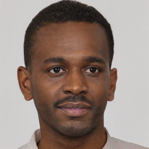 Neutral black young-adult male with short  brown hair and brown eyes