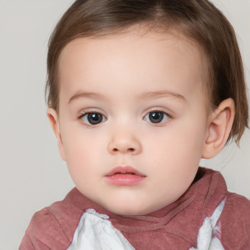 Neutral white child female with short  brown hair and brown eyes