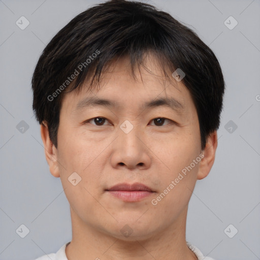 Neutral asian young-adult male with short  brown hair and brown eyes