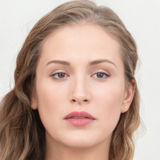 Neutral white young-adult female with long  brown hair and grey eyes