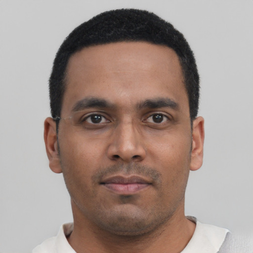 Neutral black young-adult male with short  black hair and brown eyes
