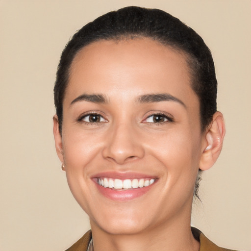 Joyful white young-adult female with short  black hair and brown eyes