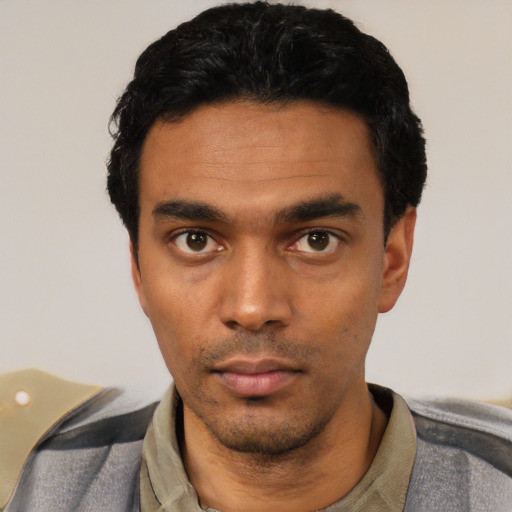 Neutral latino young-adult male with short  black hair and brown eyes