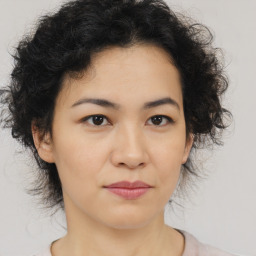 Neutral asian young-adult female with medium  brown hair and brown eyes