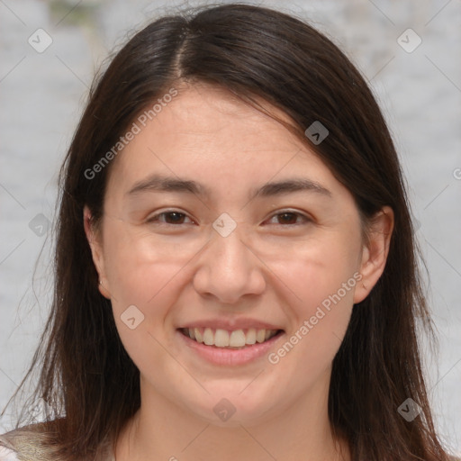 Joyful white adult female with medium  brown hair and brown eyes