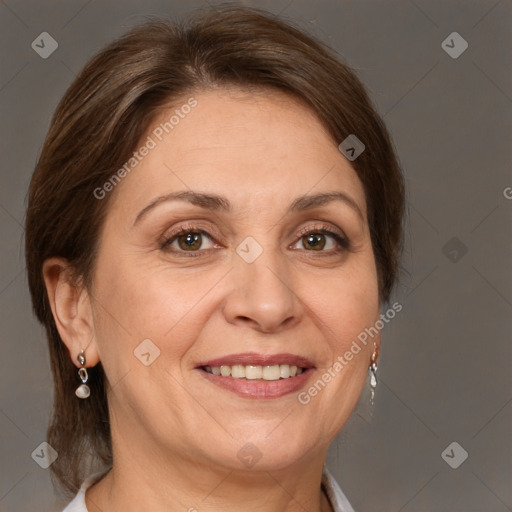 Joyful white adult female with medium  brown hair and grey eyes