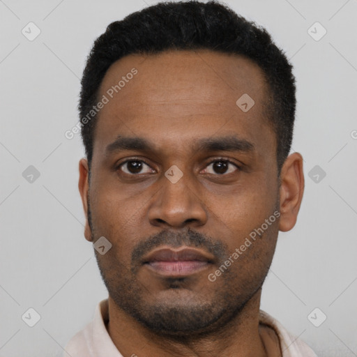 Neutral latino young-adult male with short  black hair and brown eyes